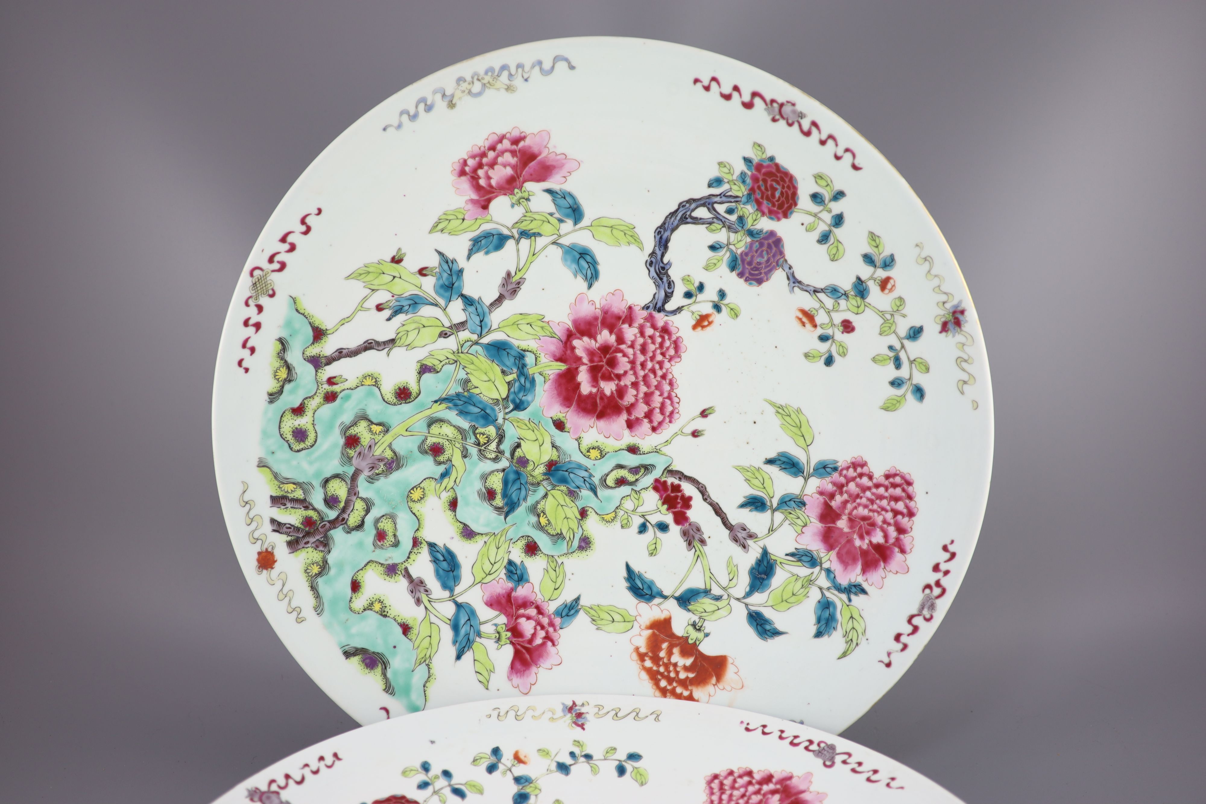 A pair of large Chinese famille rose dishes, late 19th century, 47cm diameter